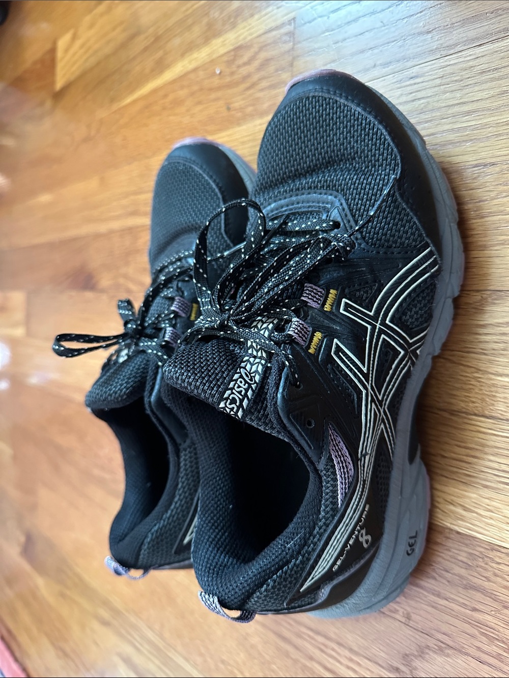 Asics Black Sneakers with Gray Soles and Subtle Purple Accents